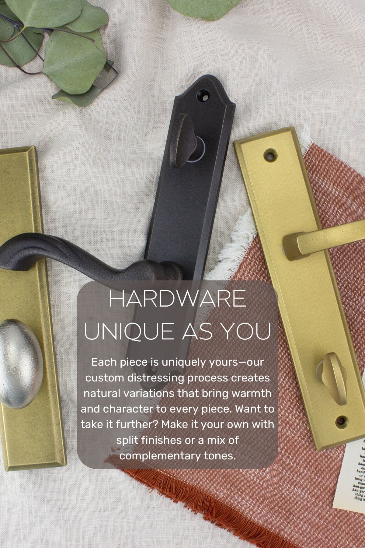 A flat lay style photo of high-quality sliding door hardware in unique distressed finishes.